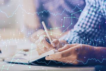 multi exposure of two men planing investment with stock market forex chart.