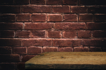 Aufkleber - Old oak Wooden table and brick  background wall.