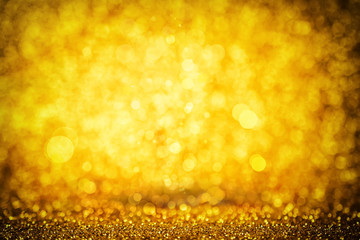 Wall Mural - Abstract golden background with magic bokeh effect