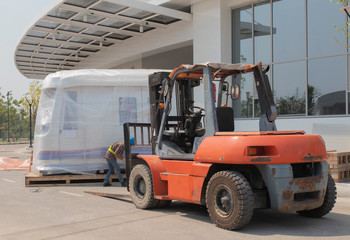 forklift is lifting train head white color for driving simulation