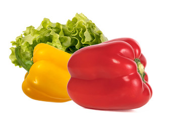 red and yellow sweet peppers and fresh lettuce isolated on a white background