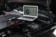 © New Africa - Laptop with diagram on auto engine. Modern car diagnostic