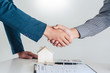 © snowing12 - House developers and customer shaking hand after finish buying or rental real estate for transfer right of property