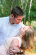 © sharafmaksumov - Young woman and guy looking to the eyes of each other with love and confidence