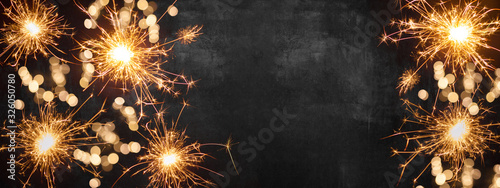 Fotografía Silvester background banner panorama long- firework on rustic dark black grey st