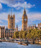 Fototapeta Londyn - Big Ben and Houses of Parliament with boats on the river in London, England, UK