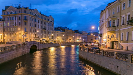 Wall Mural - Night view of the Moyka River Quay with Second Winter Bridge timelapse. Saint Petersburg, Russia.