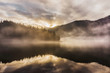© Matthieu - Sunset on the Kruth-Wildenstein Lake during a misty day of winter, Vosges, France.