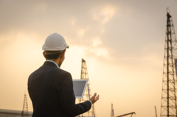 engineer is planning the construction in the construction site