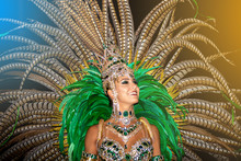 Brazilian Wearing Samba Costume. Beautiful Brazilian Woman Wearing Colorful Costume And Smiling During Carnaval Street Parade In Brazil.