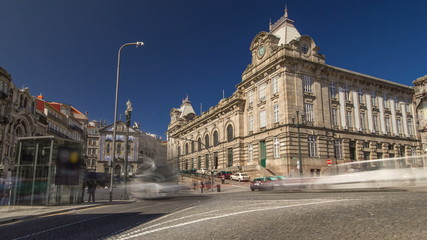 Wall Mural - View of the Almeida Garret Square with the Sao Bento railway station and Congregados Church at the back timelapse .