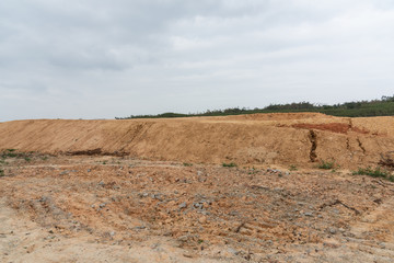 Wall Mural - Cracked mound and gravel on construction site