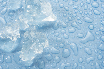 Poster - ice cube and water background