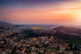 Fototapeta Niebo - Luft Panorama der Skyline von Athen, Griechenland, mit Acropolis, Altstadt und romantischem Himmel bei Sonnenuntergang