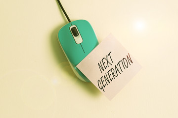 Conceptual hand writing showing Next Generation. Concept meaning product that has been developed using the latest technology Empty note paper stick to computer mouse above a pastel backdrop