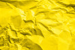 Wrinkled yellow paper background texture image
