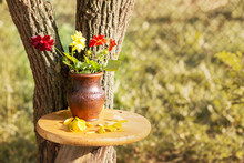 A Bouquet Of Autumn Dahlias On A Wooden Table In The Garden.