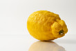 ugly organic fruits - one yellow lemon on the table