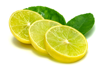 Sticker - Yellow lemon slice and leaves isolated on white background