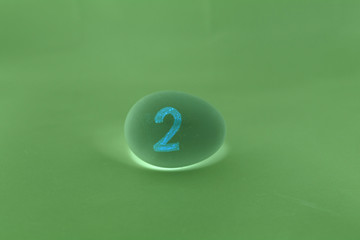 Easter number on egg. Easter egg number two Background