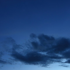 black cloud on blue night sky