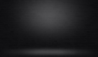Wall Mural - black brick wall background with light effect.