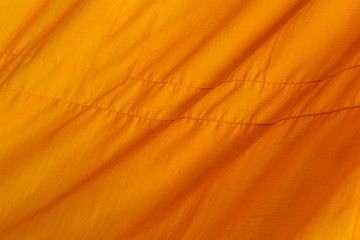 Wall Mural - orange fabric texture background