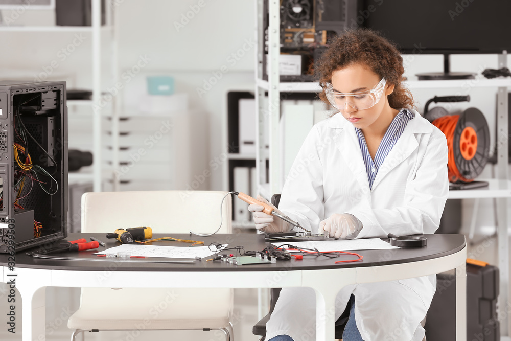 Electronic technician working in service center