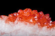 bright red ruby crystals closeup on black