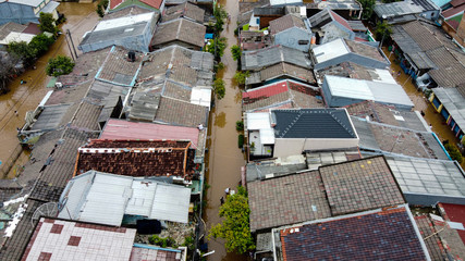 Canvas Print - Aerial POV view Depiction of flooding. devastation wrought after massive natural disasters at Bekasi - Indonesia