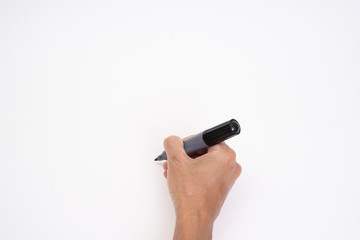 Man hand holding black magic marker pen writing on white background