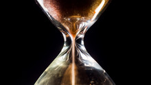 Hourglass Close-up On A Black Background