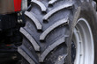 © leomalsam - huge wheels of a new large tractor for agriculture