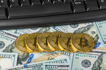 Canvas Print - Computer and bitcoins on money - business background