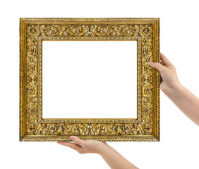 Wooden picture frame in hands