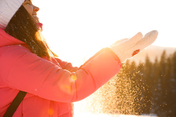 Sticker - Young woman having fun outdoors on snowy winter day, closeup