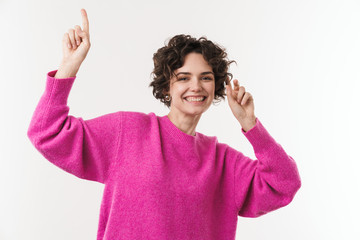 Sticker - Image of happy beautiful woman pointing finger upward and dancing