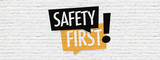 Fototapeta  - Safety first on brick wall	