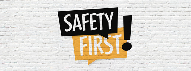 safety first on brick wall