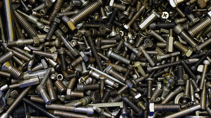 A variety of sizes of steel and stainless steel nut backgrounds