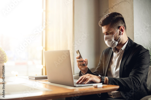 Caucasian adult bearded man indoors in cafe Poster Mural XXL