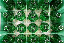Empty Green Glass Beer Bottles In The Plastic Box