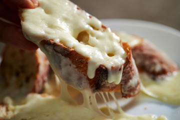 Poster - Melting cheese on baguette slice