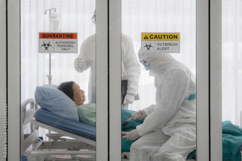 coronavirus covid-19 infected patient on bed in quarantine room with quarantine and outbreak alert sign at hospital with disease control experts make disease treatment, coronavirus outbreak control - obrazy, fototapety, plakaty 