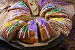 © fahrwasser - King cake for Mardi Gras, New Orlean traditional pastry with a plastic baby