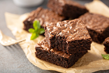 Wall Mural - Freshly baked homemade brownies on a parchment paper