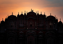 Silhouette Of Hawa Mahal Palace With Monkey At Sunset, Jaipur, Rajasthan, India
