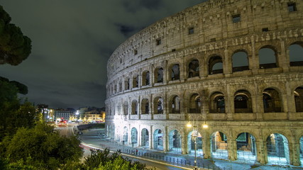 Wall Mural - view of Colosseum illuminated at night timelapse  in Rome, Italy