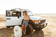 © Drobot Dean - Cheerful lovely girl playing with her dog