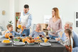 © Pixel-Shot - Family celebrating Thanksgiving Day at home